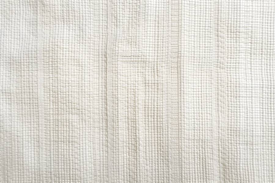 Texture of a Backdrop Composed of Pure White Cotton Fabric free texture