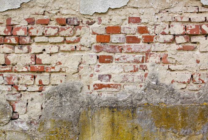 damaged plaster brick